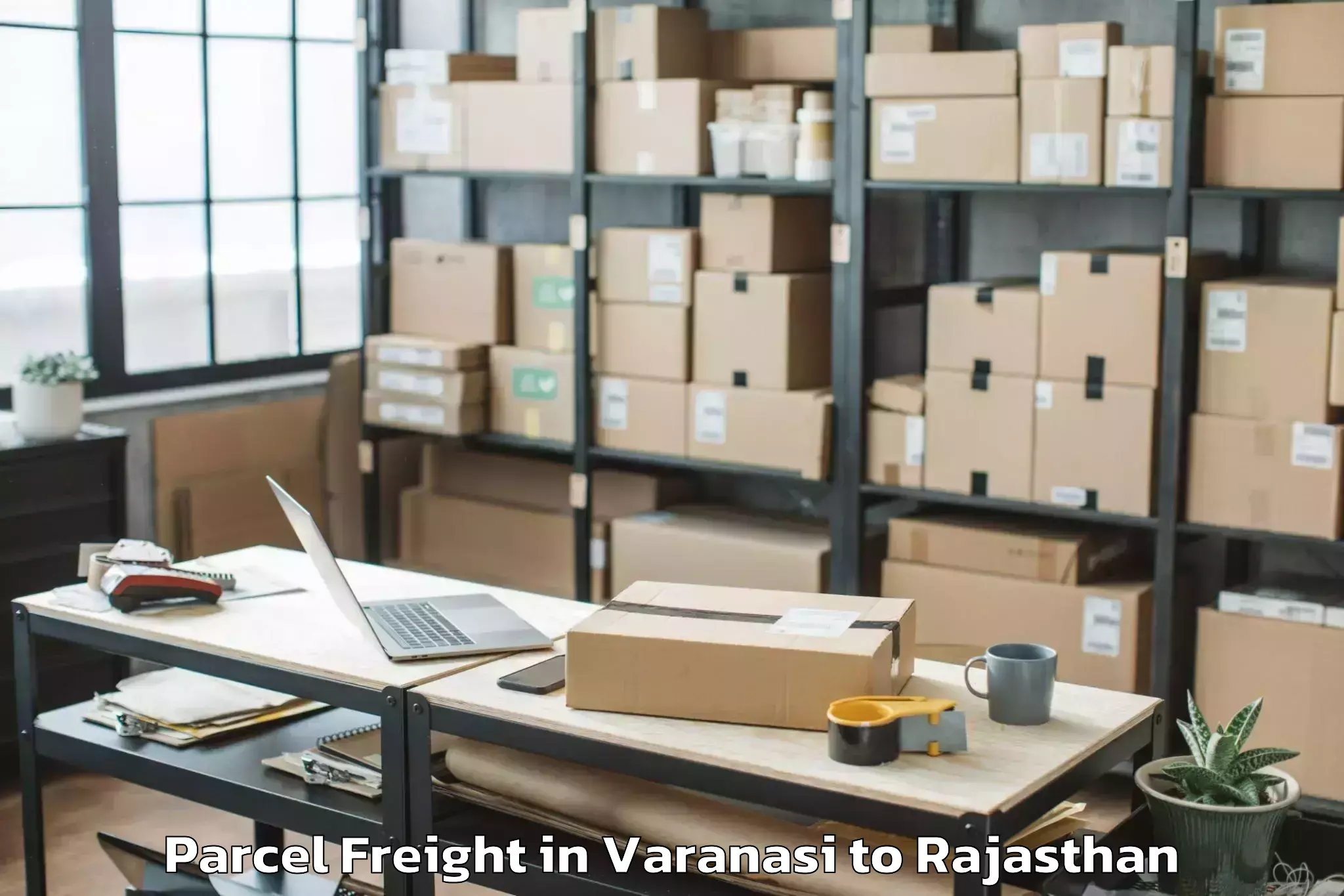 Easy Varanasi to Bagar Parcel Freight Booking